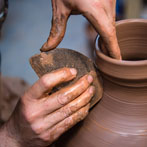 Doug Fitch and Hannah McAndrew making a jug for me